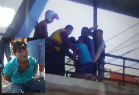 Wirath Popanom (inset) was restrained whilst attempting to jump to his death with his 7-year-old daughter.