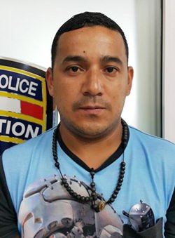 Cesar Augusto Caita Riomalo has been arrested for using a counterfeit passport with a fake name.