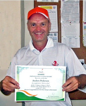 Anders Pederson displays a winning smile and his hole-in-one certificate.