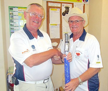 Dick Warberg (left) presents the MBMG Golfer of the Month prize to Derek Brook.