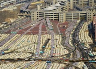 In this image released by the Saudi Press Agency (SPA), hundreds of thousands of Muslim pilgrims make their way to cast stones at a pillar symbolizing the stoning of Satan in a ritual called