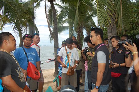 A team of officers from Bangkok’s Crime Suppression Division, Marine Police, Tourism Police, Immigration Division, and Pattaya Police Station question jet ski vendors along Pattaya Beach. Jet ski vendors were put on notice they are being watched after police rounded up and collected information on nearly six dozen Pattaya Beach operators accused of perpetrating extortion scams against tourists.