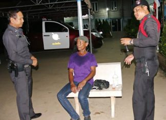 Allegedly in a drunken stupor, Udom Chanta (seated) told police he had murdered someone and wanted to turn himself in.