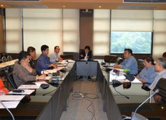 Deputy Mayor Ronakit Ekasingh (center) chairs a meeting to prepare new rules and regulations to govern the number and behavior of Jomtien Beach masseuses.