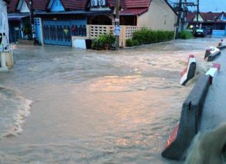 Cement barriers were no deterrent for runoff from a routine storm that hit East Pattaya’s Eakmongkol Village 8 Sept. 10.