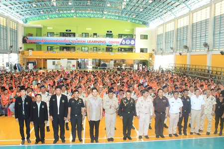 Chonburi officials handed out the first allotment of vests and identification cards to 478 Pattaya motorbike taxi drivers.