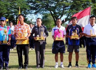 Naval Ordinance wins top trophy at Sattahip base sports games Navy team captains hold up their trophies during the closing ceremony of the Sattahip Naval Station’s internal sports competition, August 19.