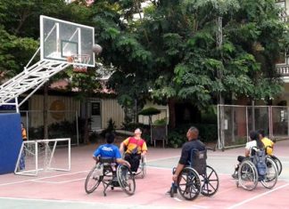 Students take part in a basketball game at the Redemptorist Vocational School in Pattaya, Friday, Oct. 2