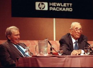 In this Sept. 17, 1993, file photo, David Packard, right, co-founder of the Silicon Valley computer company Hewlett-Packard, announces his retirement as chairman during a news conference at HP’s headquarters in Palo Alto, Calif. Packard, 81, started the company in 1939 with William R. Hewlett, who listens at left. Hewlett-Packard, one of the nation’s most storied tech companies split in two the weekend of Oct. 31, 2015, another casualty of seismic shifts in the way people use technology and big-company sluggishness in responding. (AP Photo/Joe Pugliese, File)