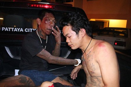 Both Itthiphol Dejboon (left) and Chanatip Wisedhom (right) were beaten by local residents before police arrived to arrest them for their involvement in a gang rape of a teenage girl.