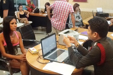 Noy Phanpradab (left) was detained then released for putting a hole in an elderly Finnish tourist’s head with his high heel.