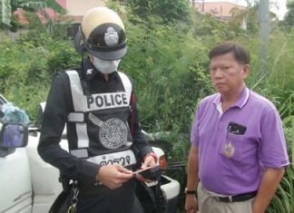 Khamron Paratanawong allegedly told police he and his wife got into a violent argument, during which time his wife yanked the steering wheel, causing the truck to slam into the motorbike and then the barrier.