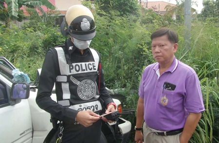 Khamron Paratanawong allegedly told police he and his wife got into a violent argument, during which time his wife yanked the steering wheel, causing the truck to slam into the motorbike and then the barrier.