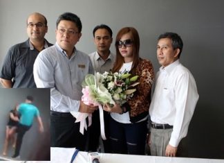 Suwith Wanichprapao, general manager of the Sunshine hotels group and manager of its Sun Exclusive Hotel, apologizes to Mon after a video of hotel security guard kicking her (inset) was widely circulated on the web.