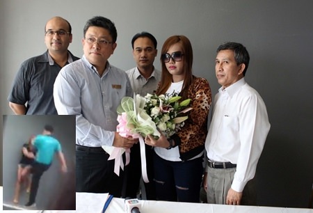 Suwith Wanichprapao, general manager of the Sunshine hotels group and manager of its Sun Exclusive Hotel, apologizes to Mon after a video of hotel security guard kicking her (inset) was widely circulated on the web.