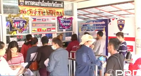 Thai - Lao border crossing bustles with activities