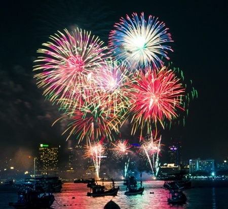 Royal yellows and blossoming flowers filled the skies over Pattaya as the International Fireworks Festival delighted residents and tourists last weekend. The Nov. 27-28 event met the goals of city planners, as Pattaya’s streets, beaches and hotels were packed for the annual pyrotechnics exhibition. (Photo by Jetsada Homklin)