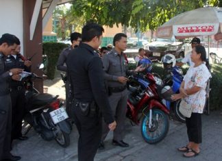 Pranee Kijsakul reports the strange mugging to police.