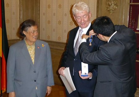 HRH Princess Maha Chakri Sirindhorn graciously presides over the medal ceremony for Juergen Koppelin.