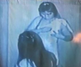 2 women charged with drugging, robbing tourists A surveillance video shows one of the two women allegedly applying Alprazolam to her nipple before drugging a customer.