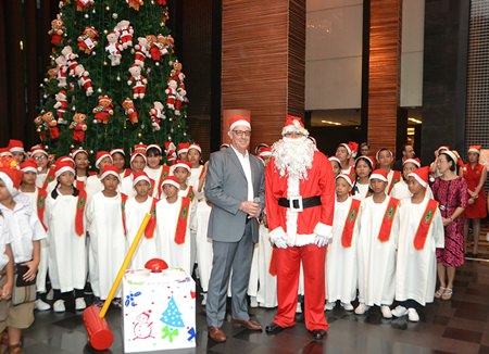 Amari Orchid Resort & Tower Resident Manager Richard Gamlin and special guest Santa Claus treat children to their annual Christmas Tree Lighting.
