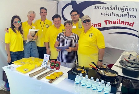 Some of the volunteers at the Disabled Sailing Thailand stand, from left to right: Pat Tippawan, Lela Aukes, Carlton Whitfield, Simon Woolston, Julie Woodbridge, Xisco McGrath, and Peter Jacops. Volunteers not on the picture include Bob Gardner, Scott Finsten and Mike Davies.