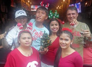 Raju, Kenny Aihara and Medal winner Mark Wood with the ladies of T.G.C.