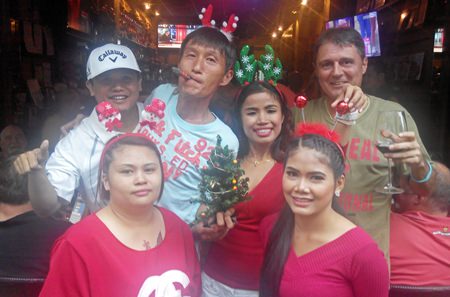Raju, Kenny Aihara and Medal winner Mark Wood with the ladies of T.G.C.