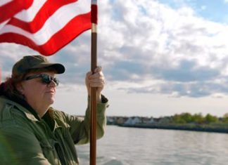 This image shows director Michael Moore in a scene from his documentary, “Where to Invade Next.” (Dog Eat Dog Films via AP)