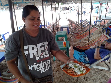Wandee, a beach chair and umbrella vendor on the beach in front of Royal Garden Plaza, said these days she relies more on Thai tourists to survive and by selling food at reasonable prices.