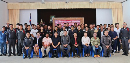 Sattahip police and local civilian volunteers sit for a group photo after their recent training session.