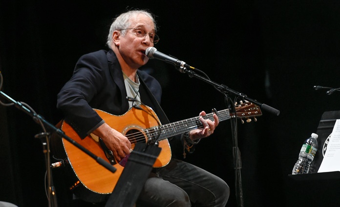 Paul Simon is shown performing at a benefit concert in New York in this Oct. 6, 2015 file photo. (Photo by Evan Agostini/Invision/AP)