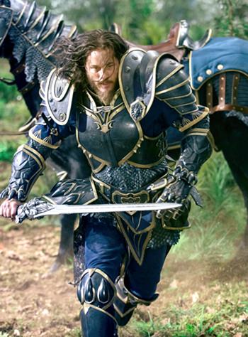 This image shows Travis Fimmel as Commander Anduin Lothar in a scene from the film “Warcraft.” (Universal Pictures via AP)