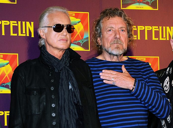 In this Oct. 9, 2012 file photo, Led Zeppelin guitarist Jimmy Page, left, and singer Robert Plant appear at a press conference ahead of the worldwide theatrical release of “Celebration Day,” a concert film of their 2007 London O2 arena reunion show, in New York. Led Zeppelin’s lawyers asked a judge Monday, June 20, 2016, to throw out a case accusing the band’s songwriters of ripping off a riff for “Stairway to Heaven.” (Photo by Evan Agostini/Invision/AP, File)