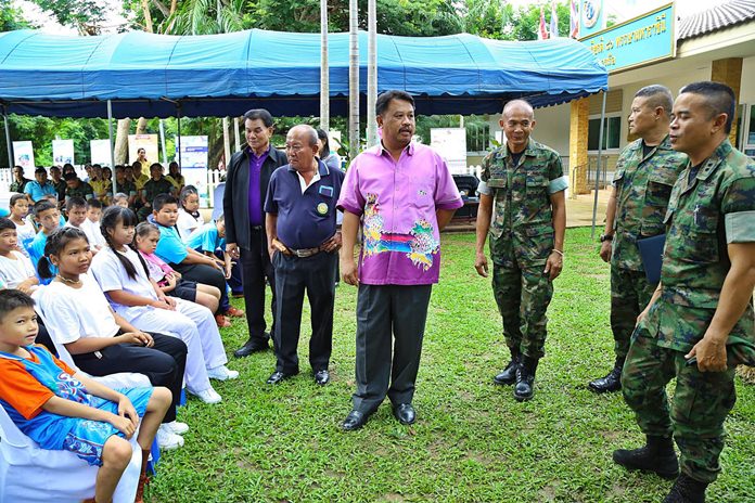 Deputy Mayor Prasong Eimsook opens the event attended by Royal Thai Navy officers and parents of autistic youths at the Nawik Yotin Base in Sattahip.