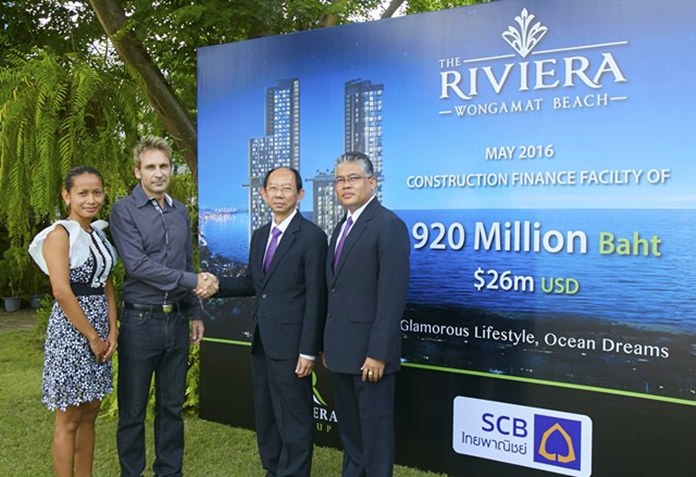 (L to R) Projects Director Sukanya Gale looks on as Riviera Group Owner Winston Gale shakes hands with FS.V.P. Sommai Ungsrithong and Chonburi Regional Manager Anol Eaksil. The Riviera Group brought to a conclusion the signing of a 920 million baht construction loan for The Riviera, Wongamat Beach on Tuesday the 24 of May. 
