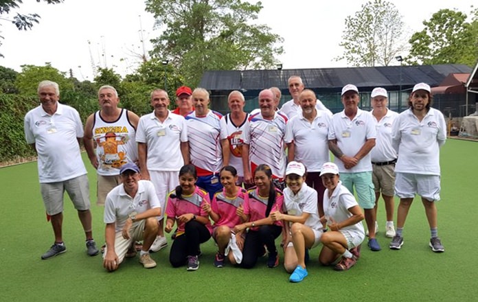 Coco Club lawn bowlers pose for a photo with their counterparts in Chiang Mai.