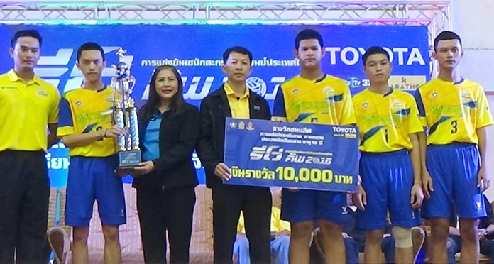 Nakhon Pathom boys youth team receives the champions trophy at the 8th Sepak Takraw Thai Championship Revo Cup in Pattaya.