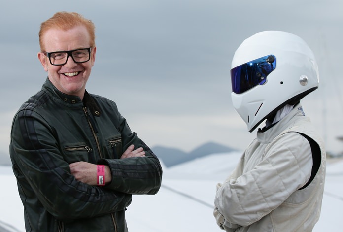 Chris Evans (left) stands with “Top Gear” character ‘The Stig’ in this Oct. 6, 2015 file photo. (Yui Mok/PA via AP)