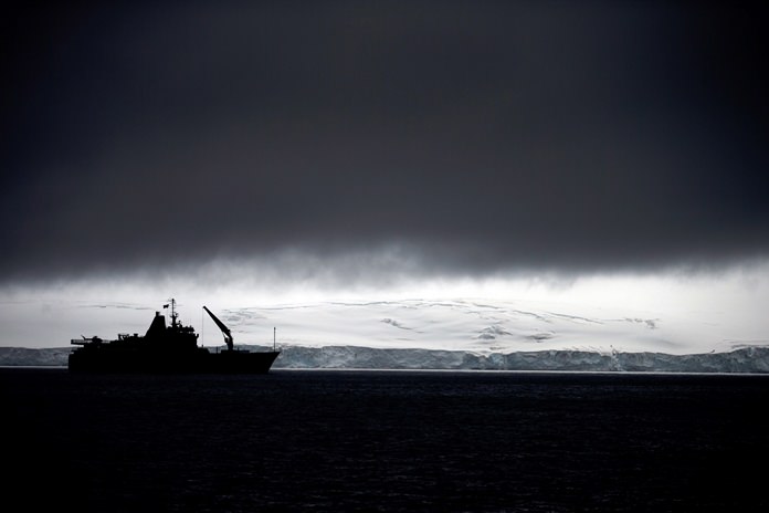 In this Jan. 25, 2015 file photo, Chile’s Navy ship Aquiles moves alongside the Hurd Peninsula, seen from Livingston Islands, part of the South Shetland Islands archipelago in Antarctica. In a study showing that the world can fix man-made environmental problems when it gets together, research from the U.S. and the United Kingdom show that the September-October ozone hole over Antarctica is getting smaller and forming later in the year. (AP Photo/Natacha Pisarenko, File)