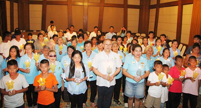 Centara Grand Mirage Beach Resort GM Andre Brulhart leads his staff and guests in a candlelight ceremony at the hotel.