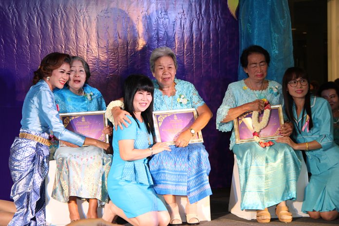 Some of the more than five dozen women Pattaya City Council honored as the area’s “best moms” for Mother’s Day are brought to the stage with their daughters.