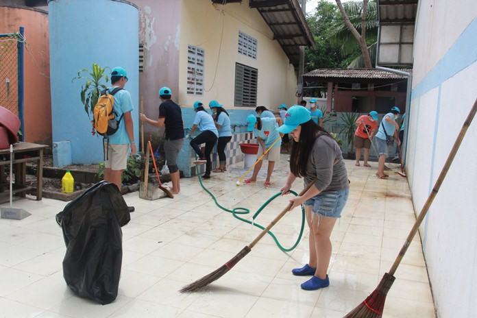 The service minded staff give the pool, toilets and premises of the Ban Kao Bai Sri School a good scrubbing. 