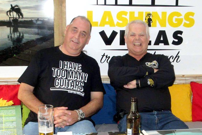Rick Bryant (left) and Kim Fletcher enjoy some downtime at Lashings Café Bar.