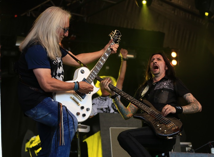Mick Box and Davey Rimmer of Uriah Heep battle it out in the middle of the Prog Stage.