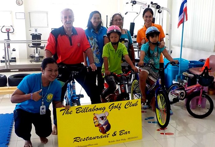 4 bicycles donated by the Billabong presented to the staff.