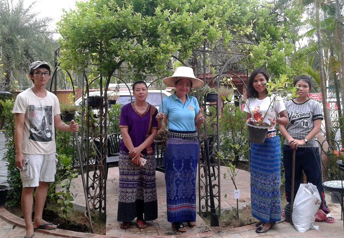 Culture Department official Natcha Kaokajang teaches local people how to plant herbs to generate extra income.