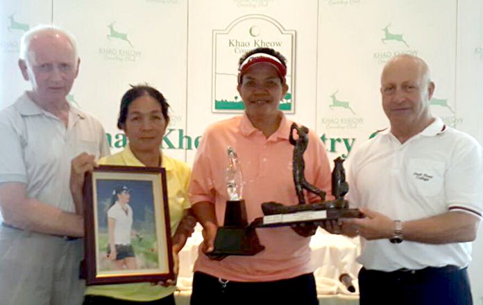 Winner Sompis Sam-ang-in accepts her trophy.