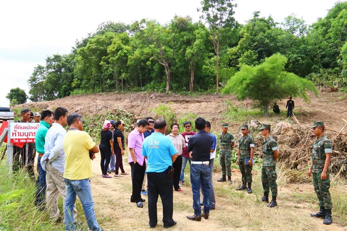 Sattahip and military officials are trying to determine who razed trees and dug up public land on Khao Malakoh.