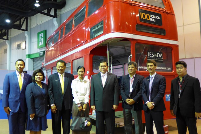 Deputy Prime Minister General Tanasak Patimapragorn (4th right) and Minister of Tourism & Sports Kobkarn Wattanavrangkul with delegation next to a genuine classic London Routemaster bus on display at Thai-UK 2016.